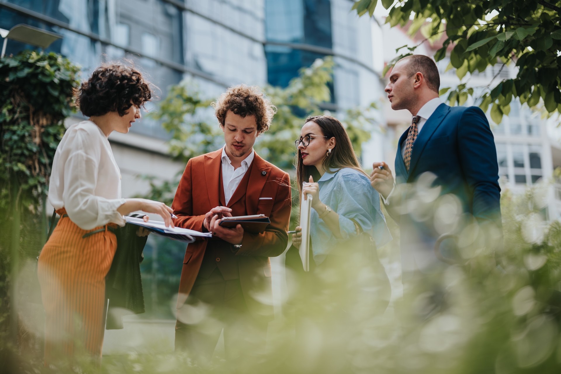 Diverse group of businesspeople having an outdoor meeting
